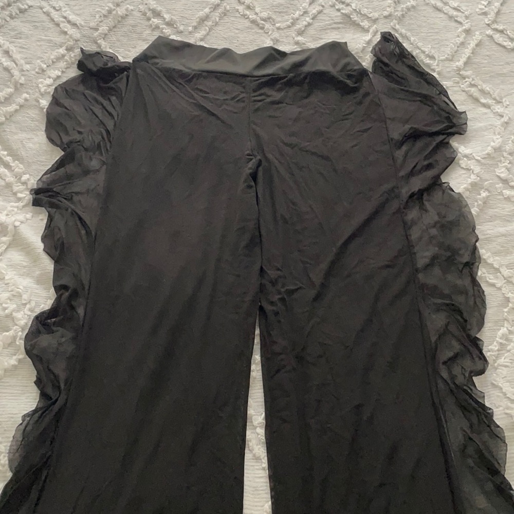 Black coverups with fringe on the sides